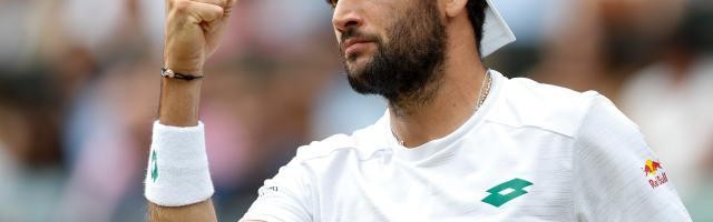 世界杯官方直播app官网入口-张奔斗：直面贝雷蒂尼的雷霆发球，德约准备好了